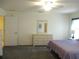 Comfortable main bedroom featuring neutral walls, and carpet floors at 14244 Sw 115Th Cir, Dunnellon, FL 34432