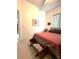 Bedroom showcasing a bed, neutral walls and carpet, and vintage dresser at 18956 Sw 93Rd Loop, Dunnellon, FL 34432