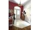 Welcoming foyer showcasing tile flooring, a stylish front door, and high ceilings at 18956 Sw 93Rd Loop, Dunnellon, FL 34432
