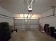 Spacious garage with ample storage space, perfect for vehicles and tools at 18956 Sw 93Rd Loop, Dunnellon, FL 34432