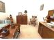 A spacious living room featuring antique furniture and ample natural light at 18956 Sw 93Rd Loop, Dunnellon, FL 34432