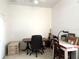Bright home office featuring a desk, chair, and ample natural light at 18956 Sw 93Rd Loop, Dunnellon, FL 34432