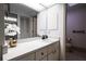 Modern bathroom with sleek vanity, a large mirror, and a clean, minimalist design at 1951 Se 37Th Court Cir, Ocala, FL 34471