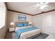 Cozy bedroom with a plush bed, soft lighting, and a serene ambiance at 1951 Se 37Th Court Cir, Ocala, FL 34471