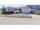 Charming single-story home featuring a well-maintained lawn, and an attached garage at 1951 Se 37Th Court Cir, Ocala, FL 34471