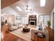 Bright living room with hardwood floors, a fireplace, and french doors leading to other rooms at 1951 Se 37Th Court Cir, Ocala, FL 34471