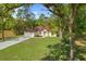 Charming single-story home features a well-manicured lawn and a classic design with a two car garage at 19939 Sw 96Th Pl, Dunnellon, FL 34432