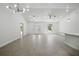 An open concept living room with vaulted ceilings and plenty of room for entertaining at 19939 Sw 96Th Pl, Dunnellon, FL 34432