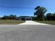 Charming single-story home boasts a manicured lawn and a welcoming two-car garage at 20652 Sw Cardinal Ave, Dunnellon, FL 34431