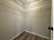 Efficient walk-in closet design featuring wire shelving that allows for ample storage space at 20652 Sw Cardinal Ave, Dunnellon, FL 34431