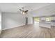 Spacious living room area featuring hard wood floors and lots of natural light at 207 Juniper Loop Cir, Ocala, FL 34480