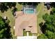 Birds eye view highlighting the private pool with screened enclosure at 21884 Sw 88Th Lane Rd, Dunnellon, FL 34431