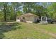 View of detached garage with a truck parked nearby, offering ample storage and parking space at 21884 Sw 88Th Lane Rd, Dunnellon, FL 34431