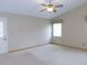 Bedroom with vaulted ceiling, fan and neutral carpet at 2865 Se 37Th St, Ocala, FL 34471