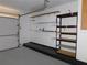 Garage interior with built-in shelving, pegboard, and plenty of storage space at 2865 Se 37Th St, Ocala, FL 34471