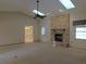 Cozy living room with fireplace, skylights, and access to other rooms at 2865 Se 37Th St, Ocala, FL 34471