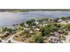 Waterfront homes with mature trees and lake access for boating and recreation at 31 Se Chinica Dr, Summerfield, FL 34491
