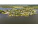 Picturesque waterfront community with direct lake access and scenic views at 31 Se Chinica Dr, Summerfield, FL 34491