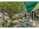 Backyard area features a patio area, mature trees, lawn, and stunning views of the water at 31 Se Chinica Dr, Summerfield, FL 34491