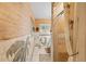 Unique bathroom with mosaic tile walls and a shower with decorative curtain at 31 Se Chinica Dr, Summerfield, FL 34491