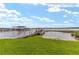 Enjoy waterfront living with private dock and boat access at 31 Se Chinica Dr, Summerfield, FL 34491