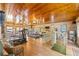 Spacious home gym with various exercise machines, wood floors, and abundant natural light at 31 Se Chinica Dr, Summerfield, FL 34491