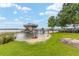 Picturesque waterfront with a dock, pier and plenty of room for entertaining at 31 Se Chinica Dr, Summerfield, FL 34491