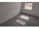 Bedroom featuring plush carpeting, neutral paint, and a natural light filled window at 3571 Se 37Th Ct, Ocala, FL 34480