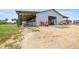 Exterior shot of the barn, showing multiple stalls and ample space for farm equipment at 5415 Nw 100Th St, Ocala, FL 34482