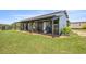Clean and well-maintained barn stalls with ample natural light, ensuring comfort for horses at 5415 Nw 100Th St, Ocala, FL 34482