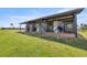 A charming horse barn featuring individual stalls and covered area for horses at 5415 Nw 100Th St, Ocala, FL 34482