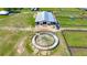 Overhead shot of a horse exerciser and horse barn, illustrating functional design for animal training and care at 5415 Nw 100Th St, Ocala, FL 34482