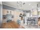 Bright eat-in kitchen featuring stainless steel appliances, breakfast bar and lots of storage at 5415 Nw 100Th St, Ocala, FL 34482