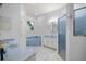 A spa-like bathroom with a soaking tub and glass enclosed shower at 5415 Nw 100Th St, Ocala, FL 34482