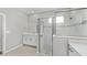 Modern bathroom showcasing glass-enclosed shower, vanity with mirror, and neutral tile at 5714 Sw 75Th Ave, Ocala, FL 34474