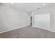 Neutral bedroom with carpet, recessed lights, closet, and ensuite door for convenience at 5714 Sw 75Th Ave, Ocala, FL 34474