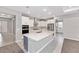 Gourmet kitchen featuring an island, stainless steel appliances and a stylish backsplash at 5714 Sw 75Th Ave, Ocala, FL 34474