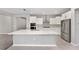 Well-appointed kitchen with an island, stainless steel appliances, and ample counter space at 5714 Sw 75Th Ave, Ocala, FL 34474