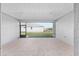 Screened lanai with concrete flooring and view of the backyard at 5714 Sw 75Th Ave, Ocala, FL 34474