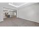 Spacious living room showcasing access to the kitchen and an open floor plan at 5714 Sw 75Th Ave, Ocala, FL 34474