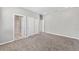 Spacious main bedroom featuring carpet flooring, neutral walls and a bathroom at 5714 Sw 75Th Ave, Ocala, FL 34474