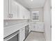 Functional pantry featuring ample storage and counter space, ideal for organization at 5714 Sw 75Th Ave, Ocala, FL 34474