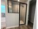 This bathroom features a glass-enclosed shower with a tiled surround and modern fixtures at 5799 Sw 207Th Ct, Dunnellon, FL 34431