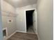 The laundry room offers a wire rack for storage and easy access at 5799 Sw 207Th Ct, Dunnellon, FL 34431