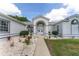 Charming single-story home with well-manicured landscaping and a double-door entrance at 5819 Ne 72Nd St, Silver Springs, FL 34488