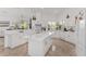 Bright, spacious kitchen with large island and ample counter space and tile floors at 5819 Ne 72Nd St, Silver Springs, FL 34488