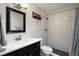 Well-lit bathroom featuring a subway tile shower and modern fixtures at 6292 Se 13Th St, Ocala, FL 34472