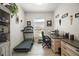 Bright office space featuring a treadmill, desk and a large window at 6292 Se 13Th St, Ocala, FL 34472