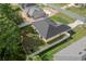 Aerial view of the fenced backyard, showcasing the home's layout, landscaping and privacy at 7370 Sw 129Th Ln, Ocala, FL 34473