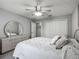 Bright bedroom with closet, ceiling fan, and neutral decor at 7474 Se 172Nd Fieldcrest St, The Villages, FL 32162
